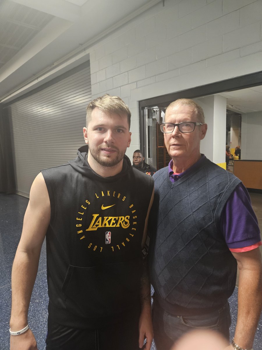 Coach Rick Walrond with Luka Dončić, 2025